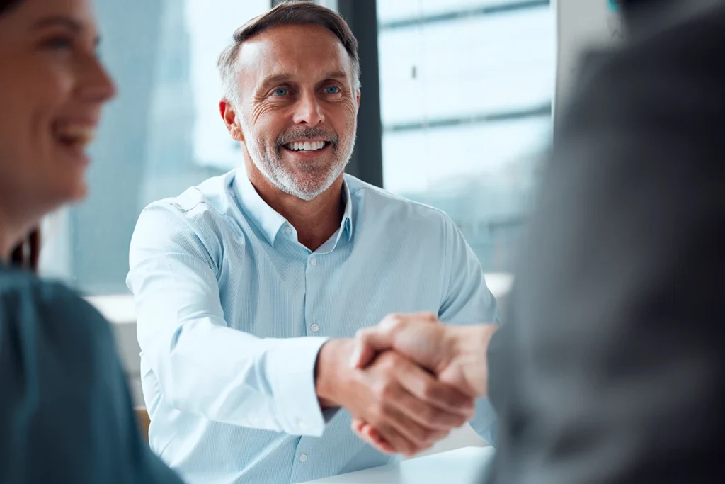 businessman shaking hands with a colleague